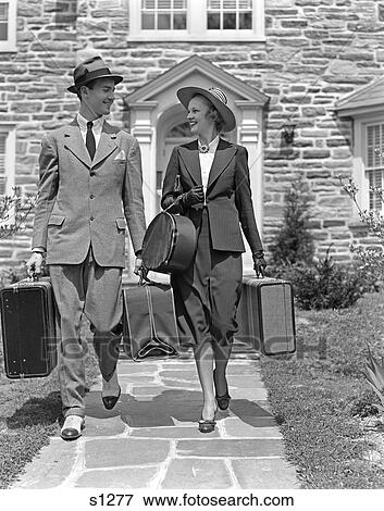 1940S Couple Leaving Home With Luggage View Large Photo Image Stock Photo - 1940S Couple Leaving Home With Luggage . Fotosearch