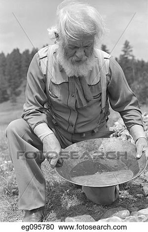 1940S Elderly Bearded Man Prospector Panning For Gold View Large Photo Image Stock Image - 1940S Elderly Bearded Man Prospector Panning For Gold. Fotosearch