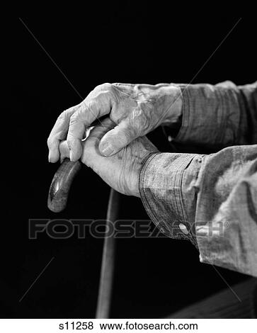 1940S Elderly Man'S Hands Holding Wooden Cane View Large Photo Image Stock Photo - 1940S Elderly Man'S Hands Holding Wooden Cane . Fotosearch