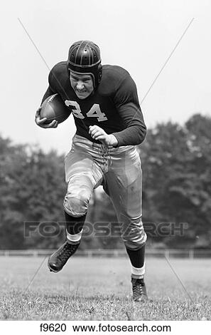 1940S Football Player Holding Ball Running Towards Camera View Large Photo Image Stock Image - 1940S Football Player Holding Ball Running Towards Camera . Fotosearch
