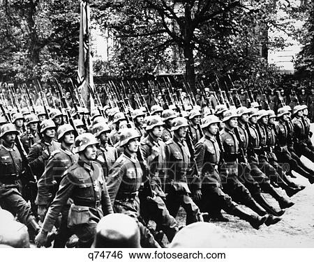 1940S German Troops Marching Goose Stepping In Streets Of Warsaw Poland 1941 View Large Photo Image Stock Photograph - 1940S German Troops Marching Goose Stepping In Streets Of Warsaw Poland 1941. Fotosearch