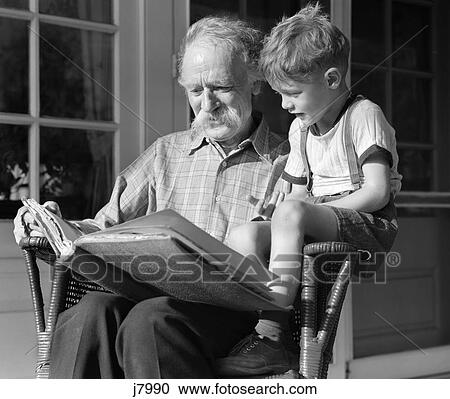 1940S Grandfather On Porch Reading To Grandson View Large Photo Image Stock Image - 1940S Grandfather On Porch Reading To Grandson . Fotosearch