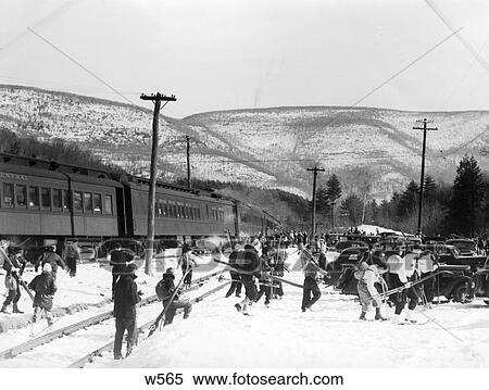 1940S Groups Of People Carrying Ski Equipmentb By Train Tracks Bear Mountain New York Car Telephone Poles R View Large Photo Image Stock Photography - 1940S Groups Of People Carrying Ski Equipmentb By Train Tracks Bear Mountain New York Car Telephone Poles R . Fotosearch