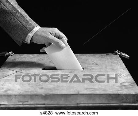 1940S Male Hand Dropping Paper Ballot In Voting Suggestion Box View Large Photo Image Stock Photo - 1940S Male Hand Dropping Paper Ballot In Voting Suggestion Box . Fotosearch
