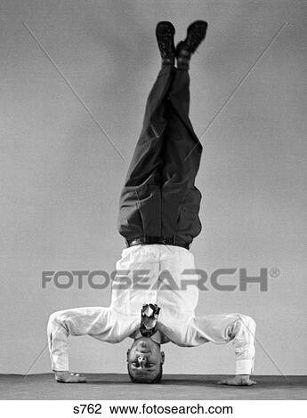 1940S Man In Shirt & Tie Standing On Head View Large Photo Image Stock Image - 1940S Man In Shirt & Tie Standing On Head . Fotosearch