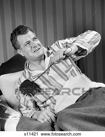 1940S Man Sitting In Bed With Flyswatter View Large Photo Image Stock Image - 1940S Man Sitting In Bed With Flyswatter . Fotosearch