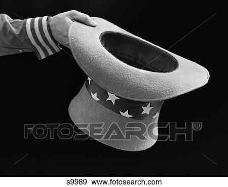 1940S Man'S Hand Holding Out Uncle Sam Hat View Large Photo Image Stock Photo - 1940S Man'S Hand Holding Out Uncle Sam Hat . Fotosearch
