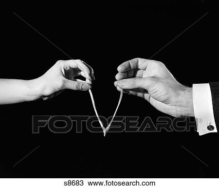 1940S Man'S & Woman'S Hands Pulling On Either Side Of Wishbone View Large Photo Image Stock Image - 1940S Man'S & Woman'S Hands Pulling On Either Side Of Wishbone . Fotosearch