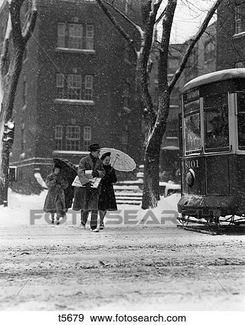 1940S One Man Two Women Walking In Snow Winter With Umberella Packages 43Rd & Spruce Street City ...