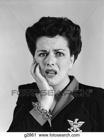 Stock Image - 1940S Portrait Of Woman With Shocked Expression Looking At Camera . Fotosearch