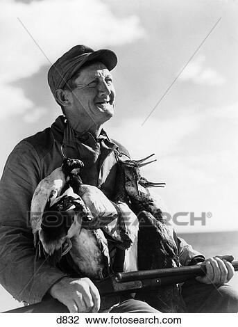 1940S Senior Man Holding Shotgun And Dead Ducks Duck Shooting View Large Photo Image Stock Image - 1940S Senior Man Holding Shotgun And Dead Ducks Duck Shooting . Fotosearch