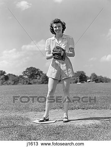 1940S Smiling Teen Girl Wearing Shorts Standing On Pitchers Mound Soft Ball Glove Mitt On Her Hand Softball View Large Photo Image Stock Image - 1940S Smiling Teen Girl Wearing Shorts Standing On Pitchers Mound Soft Ball Glove Mitt On Her Hand Softball . Fotosearch