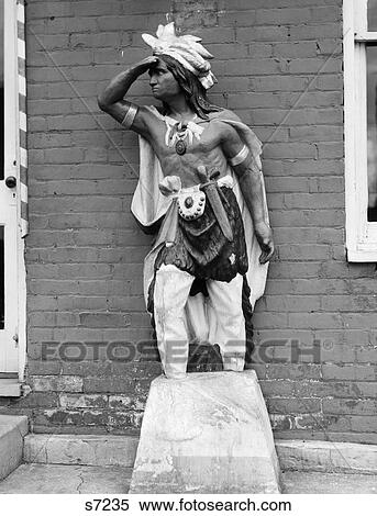 1940S Statue Of American Indian In Lookout Position At Storefront View Large Photo Image Stock Photography - 1940S Statue Of American Indian In Lookout Position At Storefront . Fotosearch