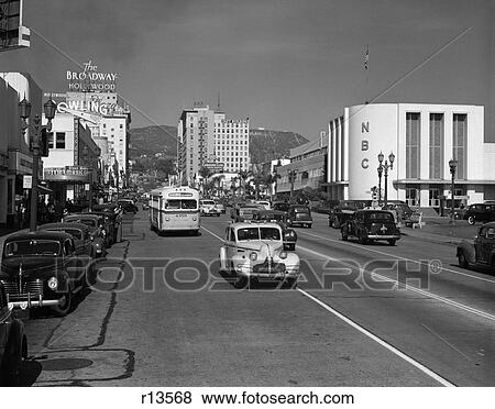 1940S Street Scene Cars Bus View Down Vine Street Near Sunset Boulevard Hollywood Los Angeles Nbc Studio The Broadway Hotel View Large Photo Image Stock Photo - 1940S Street Scene Cars Bus View Down Vine Street Near Sunset Boulevard Hollywood Los Angeles Nbc Studio The Broadway Hotel. Fotosearch