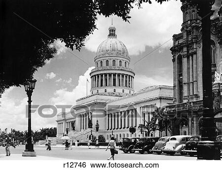 1940S Street Scene With Pedestrians Trees Lamps Motorcars & Sculptures Of The Capital Building View Large Photo Image Stock Photograph - 1940S Street Scene With Pedestrians Trees Lamps Motorcars & Sculptures Of The Capital Building. Fotosearch