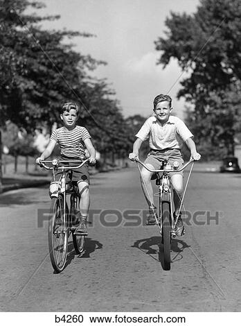 boys riding bikes