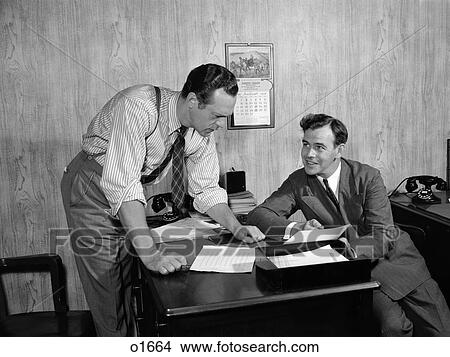 1940S Two Men At Desk In Wood Paneled Office Room View Large Photo Image Picture - 1940S Two Men At Desk In Wood Paneled Office Room. Fotosearch