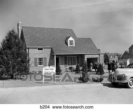 1950S Model Home With Sign Of Levitt & Sons Exhibit Home & People Milling About View Large Photo Image Picture - 1950S Model Home With Sign Of Levitt & Sons Exhibit Home & People Milling About . Fotosearch