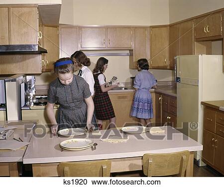 1960 1960S 4 Girls Students In Kitchen Home Economics Class Setting Table Cooking Education Retro View Large Photo Image Stock Image - 1960 1960S 4 Girls Students In Kitchen Home Economics Class Setting Table Cooking Education Retro. Fotosearch