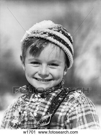 Boy Outside In Snow Smiling At Camera 1930 1930S View Large Photo Image Stock Image - Boy Outside In Snow Smiling At Camera 1930 1930S. Fotosearch