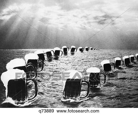 Stock Photo - Composite Photograph Mugs Of Beer On Ocean As Seen In Bally Hoo Magazine Celebrating The End Of Prohibition On December 5 1933. Fotosearch