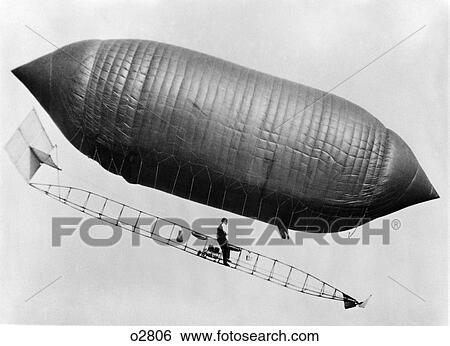 Man Riding Beneath Inflated Balloon View Large Photo Image Stock Photograph - Man Riding Beneath Inflated Balloon . Fotosearch