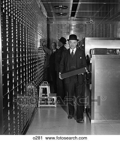 Men Man Carry Carrying Safety Deposit Box Wear Hat Suit Vault 1930S Inspect Bank Valuable View Large Photo Image Stock Image - Men Man Carry Carrying Safety Deposit Box Wear Hat Suit Vault 1930S Inspect Bank Valuable . Fotosearch