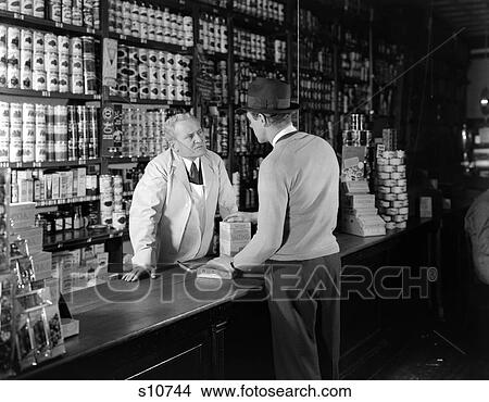 Men Store Shopping 1940 1940S Retro View Large Photo Image Picture - Men Store Shopping 1940 1940S Retro. Fotosearch