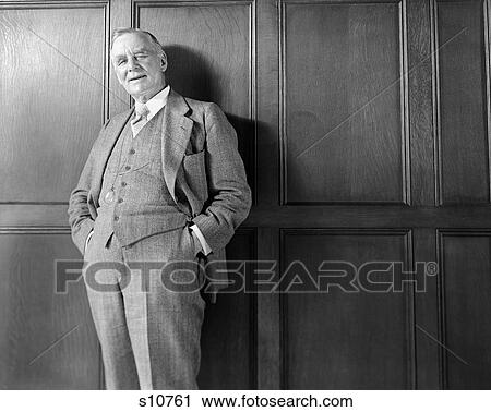 Portrait Man Standing Hands In Pockets 1940 1940S Retro View Large Photo Image Stock Image - Portrait Man Standing Hands In Pockets 1940 1940S Retro. Fotosearch