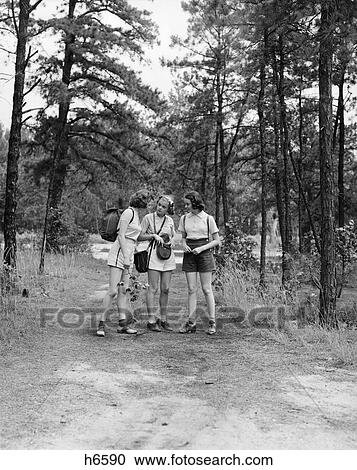 Three Young Ladies Women Woods Path 1940S Retro View Large Photo Image Stock Image - Three Young Ladies Women Woods Path 1940S Retro. Fotosearch