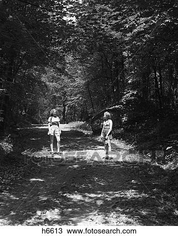 Two Young Ladies Woods Nature Trees Path 1940S Retro View Large Photo Image Stock Image - Two Young Ladies Woods Nature Trees Path 1940S Retro. Fotosearch