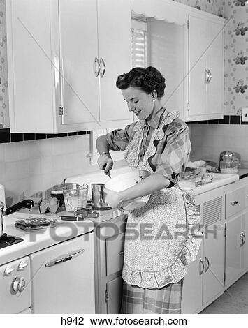Woman Baking Mixing Bowl Apron Kitchen 1940S Retro View Large Photo Image Stock Image - Woman Baking Mixing Bowl Apron Kitchen 1940S Retro. Fotosearch