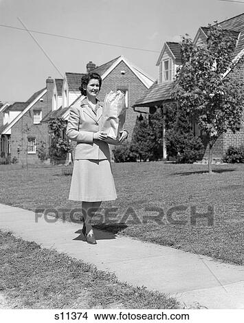 Woman Lady Groceries Sidewalk House Retro 1940 1940S View Large Photo Image Picture - Woman Lady Groceries Sidewalk House Retro 1940 1940S. Fotosearch