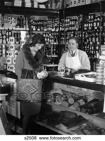 Woman Shopping Fur Stole Clerk Meat Butcher Retro 1940 1940S Retro View Large Photo Image Stock Photo - Woman Shopping Fur Stole Clerk Meat Butcher Retro 1940 1940S Retro. Fotosearch