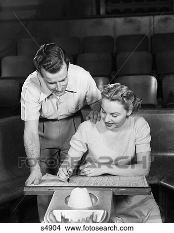 1950 1950S Couple Bowling Looking At Scoreboard View Large Photo Image Picture - 1950 1950S Couple Bowling Looking At Scoreboard . Fotosearch