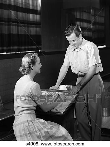 1950 1950S Couple Bowling Looking At Scoreboard View Large Photo Image Stock Photography - 1950 1950S Couple Bowling Looking At Scoreboard . Fotosearch