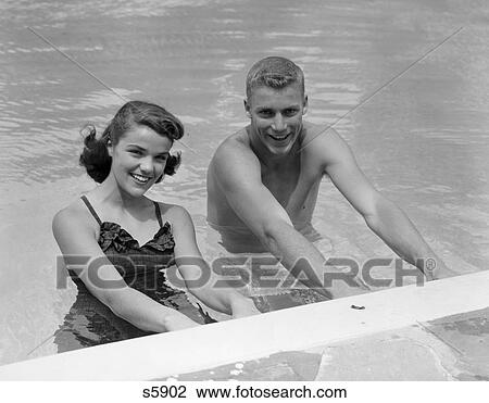 1950 1950S Couple In Swimming Pool View Large Photo Image Stock Image - 1950 1950S Couple In Swimming Pool . Fotosearch