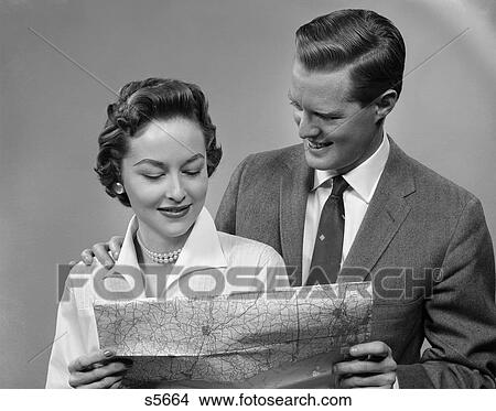 1950 1950S Couple Looking At Map View Large Photo Image Picture - 1950 1950S Couple Looking At Map . Fotosearch