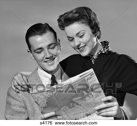 1950 1950S Couple Looking At Map View Large Photo Image Stock Photograph - 1950 1950S Couple Looking At Map . Fotosearch