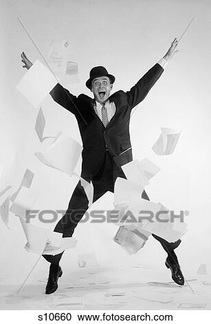 1950 1950S Man In Business Suit And Hat Jumping Papers Flying Exaggerated Expression View Large Photo Image Stock Image - 1950 1950S Man In Business Suit And Hat Jumping Papers Flying Exaggerated Expression . Fotosearch