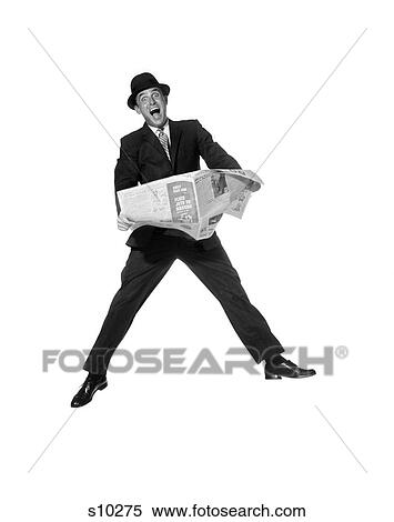 1950 1950S Man In Business Suit And Hat Holding Newspaper With Exaggerated Expression View Large Photo Image Stock Photography - 1950 1950S Man In Business Suit And Hat Holding Newspaper With Exaggerated Expression . Fotosearch
