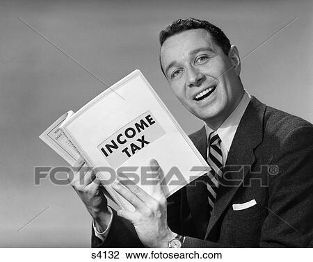 1950 1950S Man In Suit With Income Tax Book In Hand View Large Photo Image Stock Image - 1950 1950S Man In Suit With Income Tax Book In Hand . Fotosearch