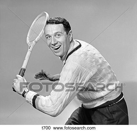 1950 1950S Portrait Of Man Smiling Playing Tennis Holding Racket View Large Photo Image Stock Image - 1950 1950S Portrait Of Man Smiling Playing Tennis Holding Racket . Fotosearch