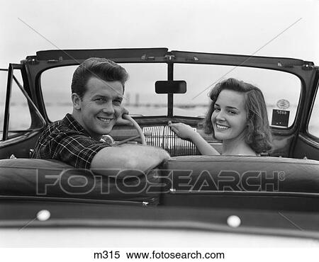 1950 1950S Retro Convertible Couple Man Woman Date Smile Car View Large Photo Image Stock Photography - 1950 1950S Retro Convertible Couple Man Woman Date Smile Car . Fotosearch