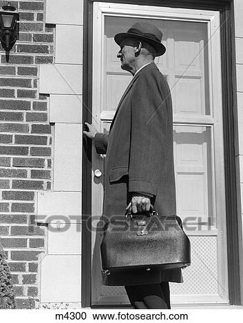 1950 1950S Retro Doctor Housecall Door Briefcase Bag Hat Illness View Large Photo Image Stock Image - 1950 1950S Retro Doctor Housecall Door Briefcase Bag Hat Illness . Fotosearch