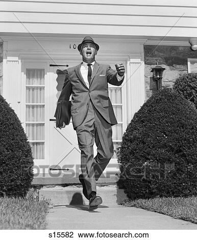1950 1950S Retro Man Suit Sidewalk Tie Hat Walking Stride View Large Photo Image Stock Image - 1950 1950S Retro Man Suit Sidewalk Tie Hat Walking Stride. Fotosearch
