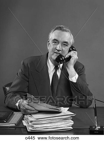 1950 1950S Retro Man Telephone Call Work Business Paperwork Pen  View Large Photo Image Stock Photography - 1950 1950S Retro Man Telephone Call Work Business Paperwork Pen . Fotosearch
