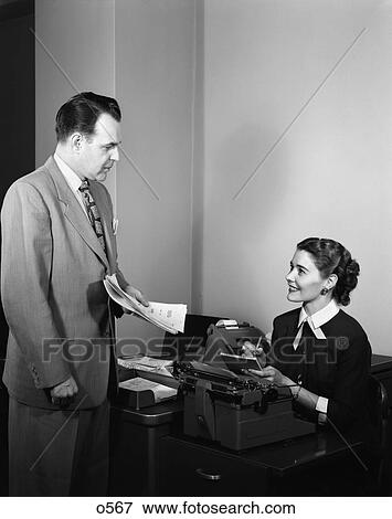 1950 1950S Retro Man Woman Boss Notes Secretary Suit Business View Large Photo Image Stock Photo - 1950 1950S Retro Man Woman Boss Notes Secretary Suit Business . Fotosearch