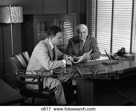 1950 1950S Retro Men Meeting Business Suits View Large Photo Image Stock Photo - 1950 1950S Retro Men Meeting Business Suits . Fotosearch