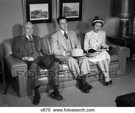 1950 1950S Retro Men Woman Sofa Couch Sitting Hats Waiting Room Suit View Large Photo Image Stock Image - 1950 1950S Retro Men Woman Sofa Couch Sitting Hats Waiting Room Suit . Fotosearch